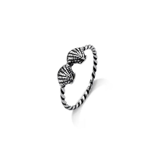 Twin cowrie with twisted band ring